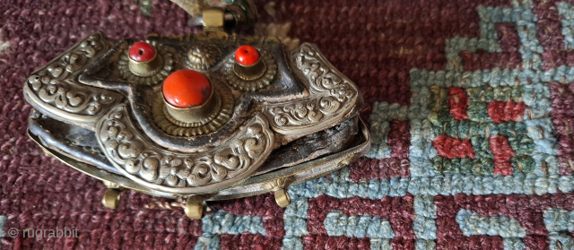 A beautiful antique tibetan Baghu purse with corals                         