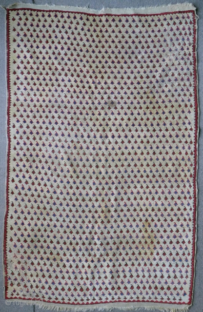 Small rug, size 147x94cm. Hesitate to guess on date or attribution - possibly Turkmen or Uzbek origin. Colours are natural though pile mostly low – knots visible. Some staining and moth damage.  ...