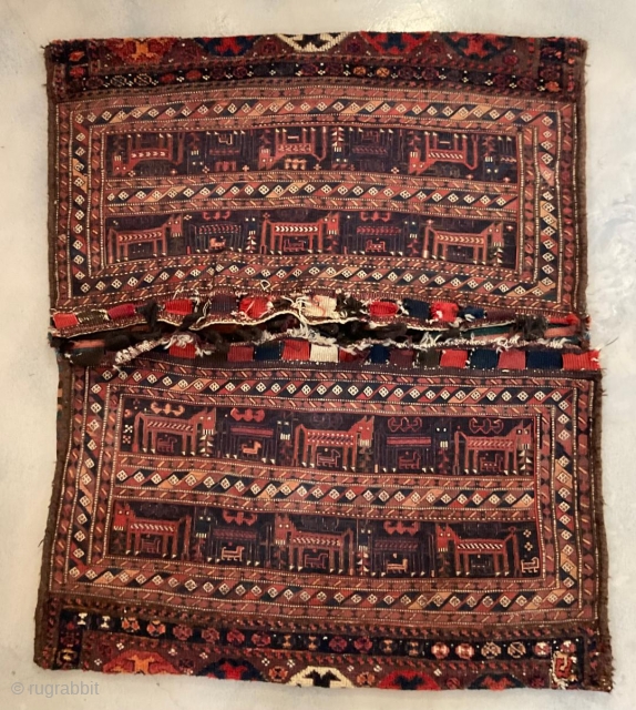 This antique Bakhtiari or Luri Camel Bag, dating back circa 1900, is a stunning piece of decor for collectors of decorative items. With its Sumak weave and piled ends, this camel bag  ...