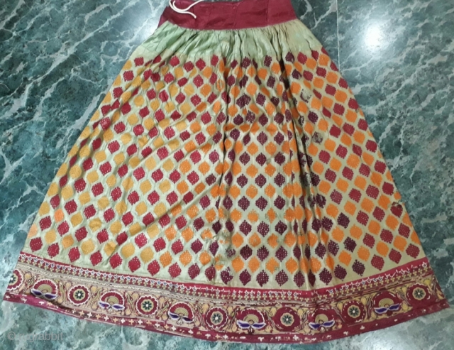 The Antique textile is an intricately embroidered skirt known as ari or mochi embroidery from kutch region in state of Gujarat Approx 1900 century. A type of chain stitch done with the  ...