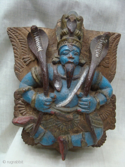   Wooden Polycrome Garuda 
( The Vahana of Lord Vishnu ).

 Wooden Guruda Brackets for Temple Chariots from Tamil Nadu( south India ).

 Garuda is known as the eternal sworn enemy  ...