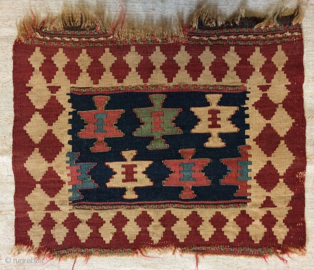 Rare and beautiful 19C Shahsavan kilim bagface, approx 42cm x 35cm.

I thought this was a chanteh but now realise it was part of a spoonbag set. I have included a picture of  ...