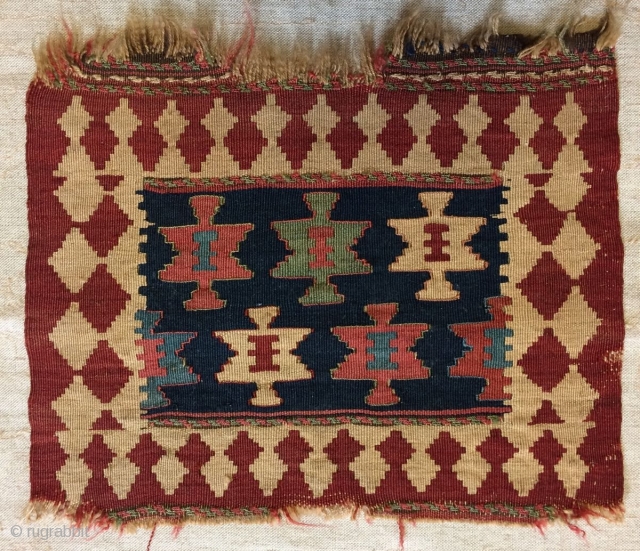 Rare and beautiful 19C Shahsavan kilim bagface, approx 42cm x 35cm.

I thought this was a chanteh but now realise it was part of a spoonbag set. I have included a picture of  ...