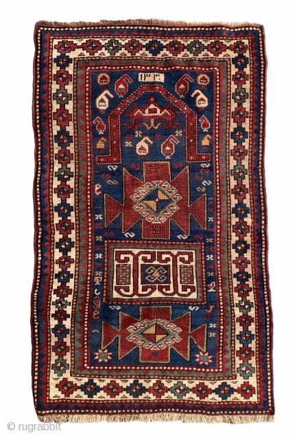 Antique Kazak dated rug low pile but overall it is in good condition. Size is 148 x 86 cm              