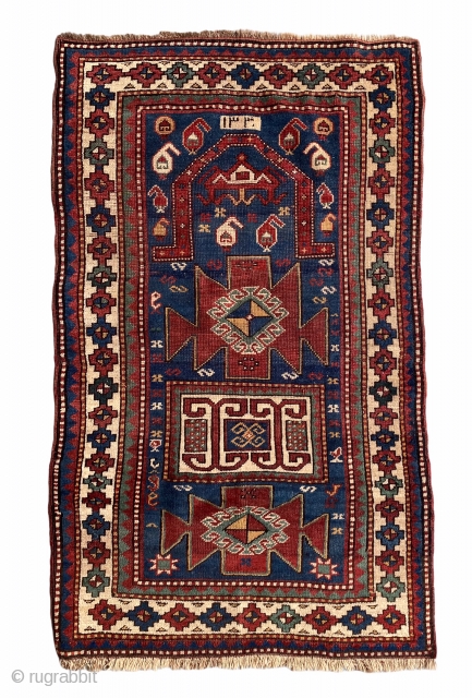 Antique Kazak dated rug low pile but overall it is in good condition. Size is 148 x 86 cm              