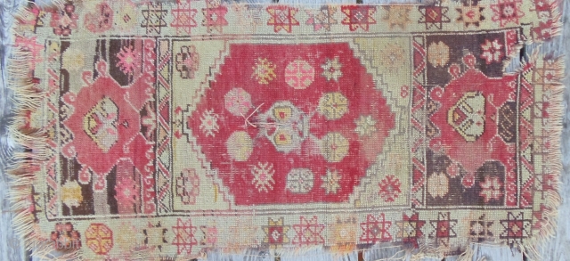 Central Anatolian Yastik - Antique - Possibly mid 1800's All natural dye. Distressed hence low price. Size 1' 5" x 3' 4" (43 x 101) $100 inc S&H     