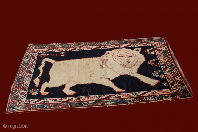 Antique lion and birds gabbeh rug.195x106 cm.some wears all over.                       