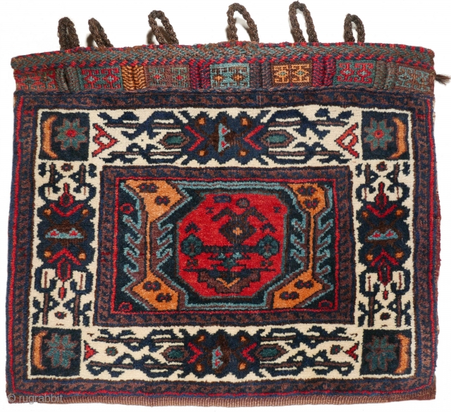 # 1111 Rare Afshar Khorjin Half, 56/46 cm, Varamin or Khorasan area, ca. 1900, unusual field design with a single boteh, great white ground border, very good condition! For a complete overview  ...