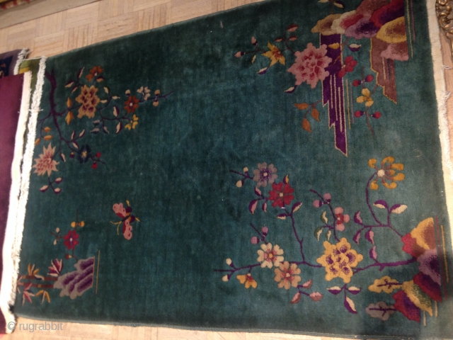 Antique Chinese rug predominantly green in color with a beautiful floral design.
3.5 x 4.9 in size 
                