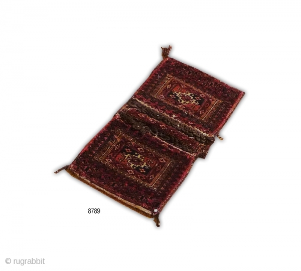 A glorious small antique tekke 'khorjin' or saddle bag.
Turkeman, central asia.
Age: circa 1890.
Materials: wool on wool foundation.
Condition: excellent. 
Design: Tekke major and minor guls.
Colours & weave: natural dyes. fine, tight weave.
52x27cm  