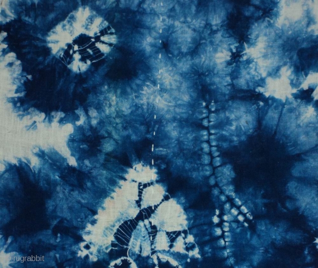 Indigo Kumo Shibori ‘zoikin’, Japan, Taisho (c.1920), 134x33cm. The common English translation of the Japanese word shibori is "tie-dye". However, a more accurate translation is "shaped-resist dyeing," which describes the inherent patterning  ...