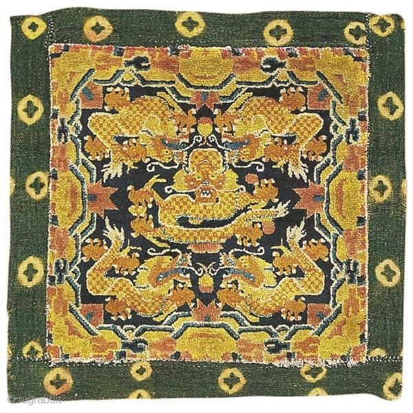 NINGXIA mat, NW China, second half 19th century, cm 66x68 (including the Tibetan bo-lou textile adder border, size reads cm 78x80). Excellent overall condition; full pile. Provenance: Ulrich Schurmann, Cologne.   