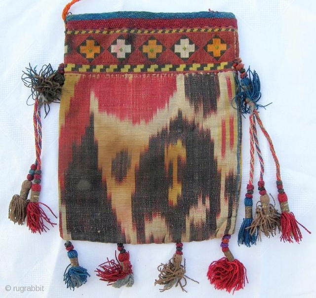  Rare antique Uzbek money bag, IKAT, cross-stitched embroidery is VERY thin, late 19th, in good condition. Size is 7" x 5.5", 17 x 13 cm.       