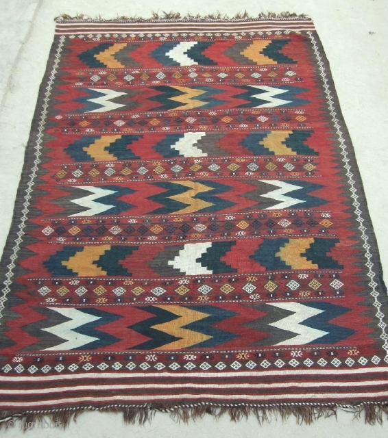 This pictured piece, a uzbek tadjik kilim, is an interesting example of early 20th century Central Asian kelim work. The colour palette is pleasing. Size is 285-190 cm, 9'6" x 6'4". In  ...