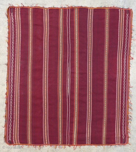 Antique Calcha poncho from Bolivia. Late 19th century or very early 20th century. Very finely woven. All wool. Beautiful colors, which are probably natural. 

Good condition for age with some small holes  ...