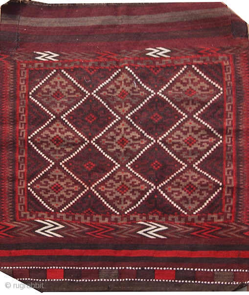 Saddle bag (front only) #3760
Origin: Central Asia, Uzbeki. 
Size: 3'2" X 3'8" 
Age: mid 20th c. 
Wool. Interlock tapestry weave. Narrow rows of twining and banded plain weave ends. 

This is the  ...