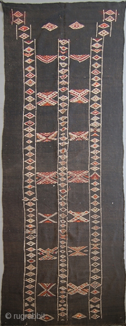 Moroccan tent rug	
Flat-weave  rug. Tarfaft
Origin: Morocco.Middle Atlas. Berber
Size:5'2X16'2 
Age: 3d quarter, 20th c.
Wool and Goat Hair . Plain weave with large motifs of spot brocading 
Condition: Good. 
These can be seen  ...