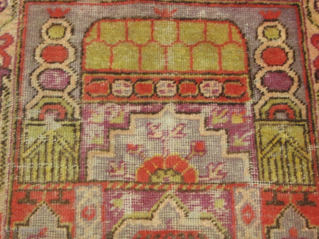 Antique Khotan prayer rug early 20th century . four crecents at the corners. mosque desing in the centre. worn at some places. size 2' x4'.
Any offers welcome regarding price.
Free worldwide shipping.  