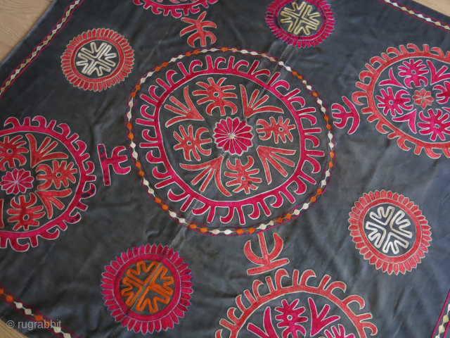 Kirgiz Bokhcha silk embroidery on cotton. miner wears form being used. black cotton lining. size 105 cm X 120 cm contact vedatkaradag@gmail.com           