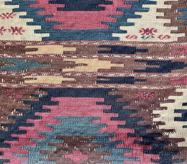 This is a Turkmen Yomud kilim but the pattern is Borchali Caucasian. It resulted in a unique different design.              
