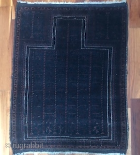 Timuri blue ground squarish prayer rug 32x35". 2 cord red and blue checker board selvages and kilim ends intact.
good condition for age. 1" band of thinning across lower 1/3rd consistent with kneeling  ...