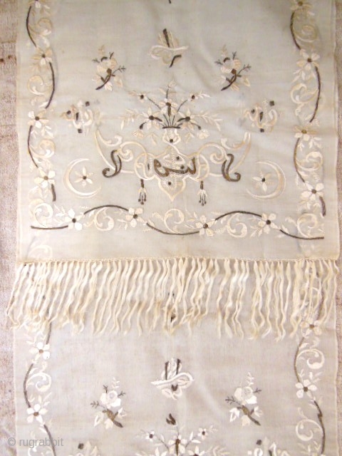 Ceremonial turkish stole or scarf late 19c.The cream silk organza or gauze is completely embroidered with gold thread and silk cream thread. At each end, flower wreaths are framed by Turkish croissants,  ...