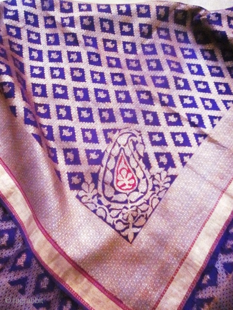 Beautiful Indian purple silk square and gold brocaded shawl originating from Varanasi in India. Varanasi or Benares in the region of Uttar Pradesh had made a specialty of this type of rich  ...