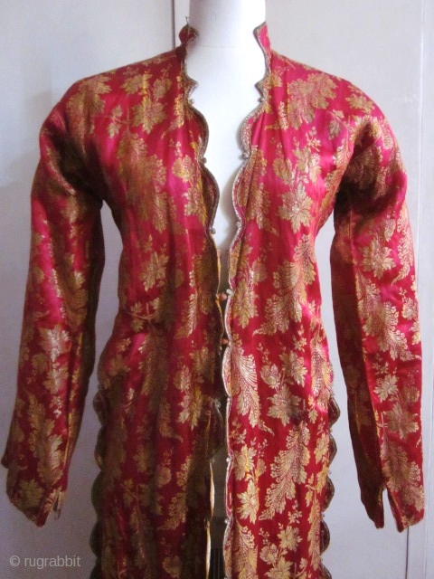 Fushia and gold brocaded satin silk Bindalli from Ottoman Empire late 19c early 20c. Usually used for ceremonial event . Beautiful brocaded fuchsia satin with gold thread and floral garlands, entirely piped  ...