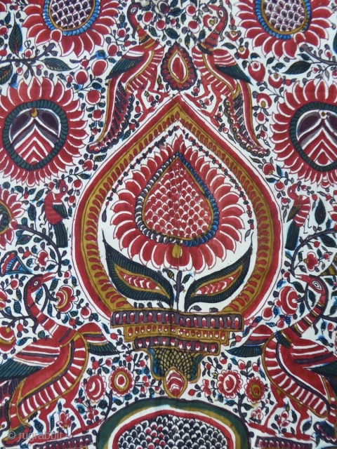 Palampore printed and painted on Cotton  1825/1850
India for export to Europe. Rich floral and figures repertoire with large central rosette. Flowers, pomegranates, peacocks, birds of paradise, scales compose a rich decoration  ...