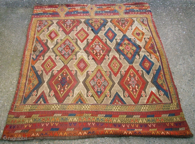 Antique anatolian Konya Cicim Flatwave. Size: 148 x 122 cm. Great colors and fine weaving. Very interesting collectors piece. It is fixed on a silk fabric. Some flaws. Used.    