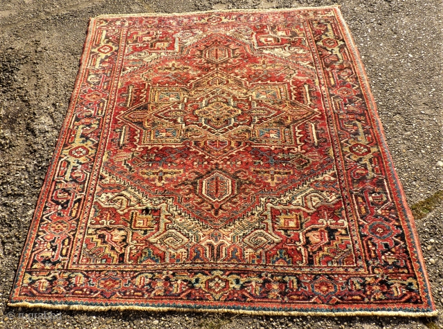 Very nice Heris rug. Size: 145 x 179 cm. Full pile. One small repair.                   