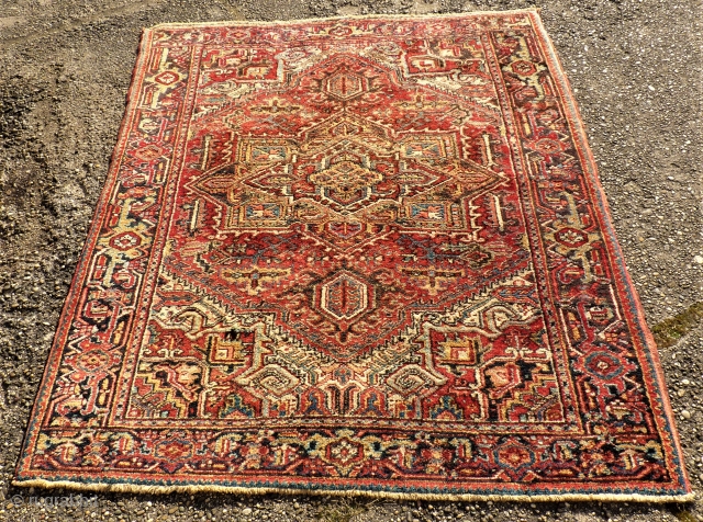 Very nice Heris rug. Size: 145 x 179 cm. Full pile. One small repair.                   