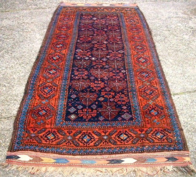 Wonderful old Baluch! Size: 130 x 287 cm. Some lost pile. The rug is clean.                  