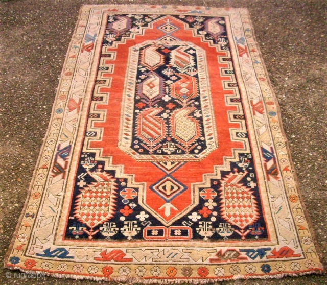 Nice caucasian rug. Fine knotting. Size: 104x185 cm. Used and thin pile. Colors bleached.                   