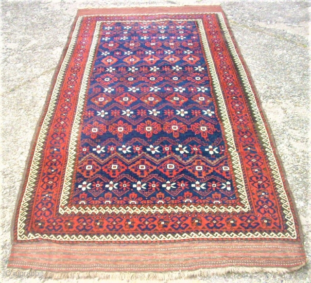 very old and nice baluch rug. size: 127 x 250 cm. Good condition.                    