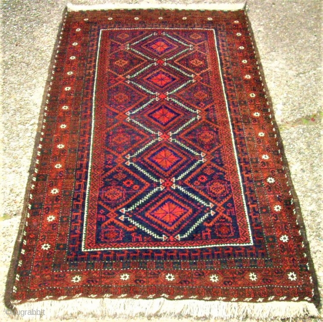 Old Baluch rug. Size: 100 x 175 cm. Very good condition. Interesting ornamentic with animals.                  