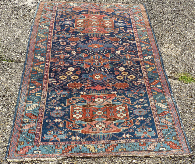 antique caucasian rug. Size: 110 x 160 cm. Used pile. Wonderful colors. Interesting rug.                   