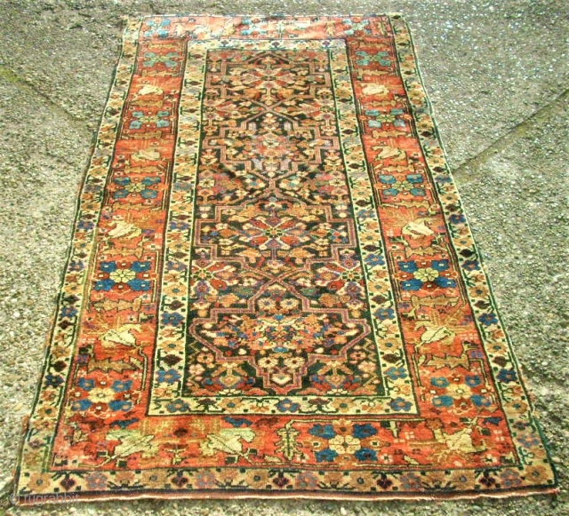 Antique Caucasian rug? Size 99 x 180 cm. Good pile. One edge damaged. Used. Wonderful colors.                 