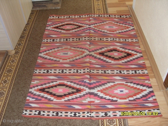 Sarkoy Kosovos kilim, measuring about 1,3x1m, 
Antique, in good condition.



                       