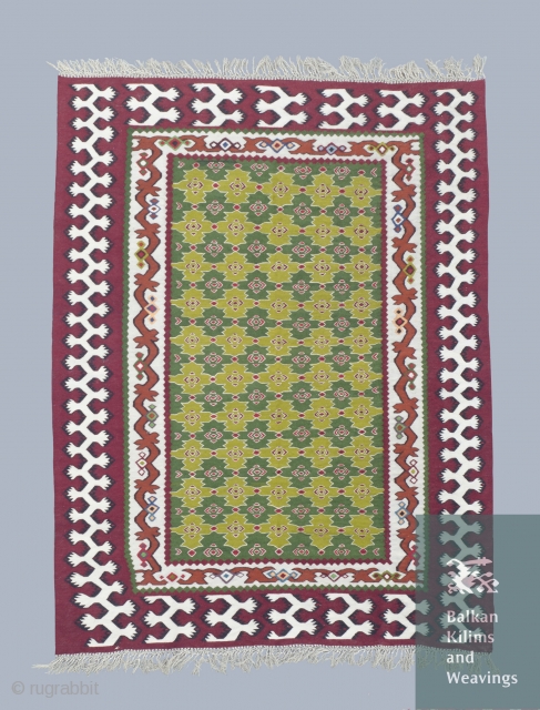 An interesting Pirot sarkoy kilim  with  kostenica  motif in the borders, measuring about 1.5x2m                
