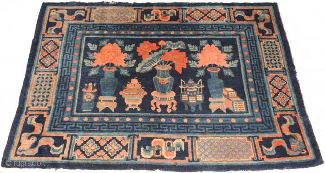 Attractive and very interesting carpet, seemingly from the Baotou-Suiyuan region of China with deep rich lustrous colours. And 'seemingly from Baotou-Suiyuan' only because although the design and colours point to there, this  ...