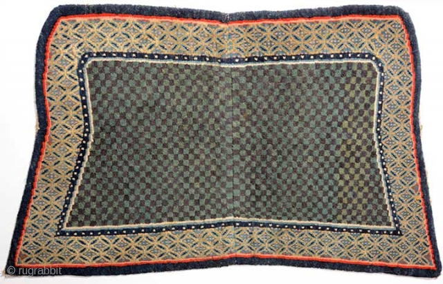 Tibetan under-saddle carpet (makden) of the so-called 'butterfly type', the shape of which is generally believed to have been 'introduced' by the Younghusband expedition to (i.e. the British invasion of) Tibet in  ...