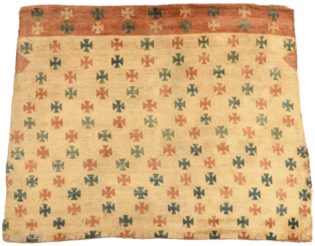 Tibetan woolen cover or ‘blanket’ made for use on a horse or yak with ‘crusader-like-cross’ motifs arrayed in a staggered linear pattern across the face that gives a pleasing fluid movement to  ...