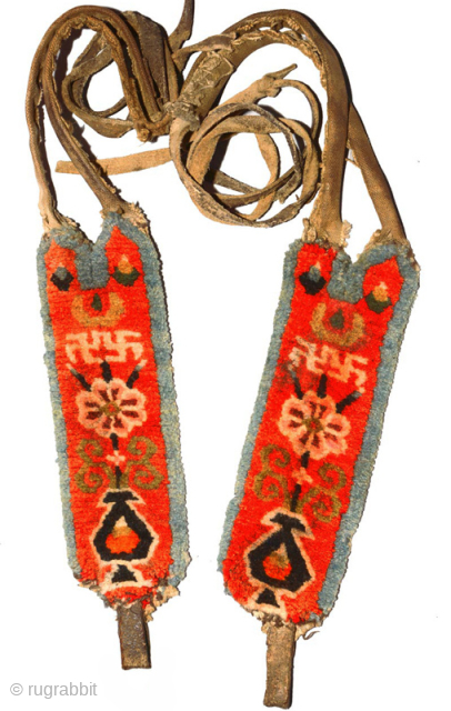 Matched pair of decorative Tibetan horse trappings which would have attached at rear to either side of the saddle and then run back over the horse’s rump where and then fastened around  ...