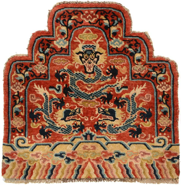 Rare Tibetan-knotted throne back or 'seating-back' carpet most likely made for a Buddhist lama associated with one of the 'red hat' Buddhist sects in Tibet. All three dragons are superbly drawn in  ...
