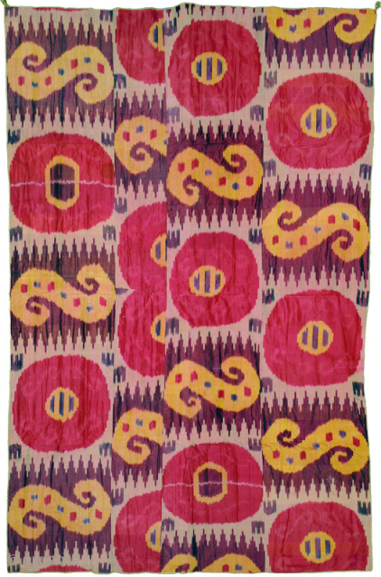 Impressive Central Asian four-paneled silk ikat, most likely Uzbek, from the late 1800’s / 19th century with a red cotton floral print backing. It features red poppy-like circles - or to some,  ...