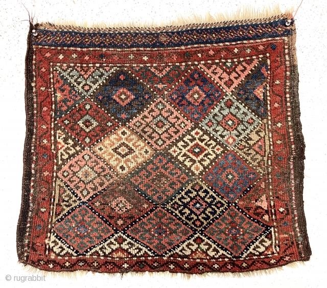 Antique jaf Kurd diamond bagface. Interesting example with the less common “dotted” lattice. Overall low pile with scattered wear as shown. All good natural colors including several reds, blues, a nice camel  ...