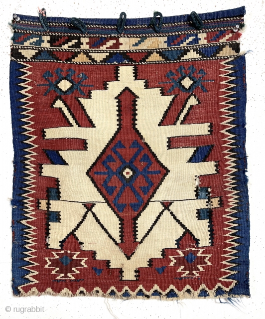 Antique unusual flat woven bagface with a design typically found on large kuba kelims.  This kelim bagface has original selvages and end closure loops on top. Unraveling at bottom. As found,  ...