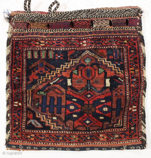unusual northwest persian complete bag. How do you fit a large medallion into a small field? Decent pile. All good natural colors. Original back and closure tabs. Late 19th c. 21" x  ...