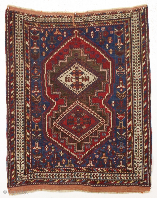 antique diminutive afshar rug. Nice almost square size. Fun border. "as found", dirty with a bit of wear but complete with original fancy selvages and kelim ends. Oxidized browns. Charming little rug.  ...